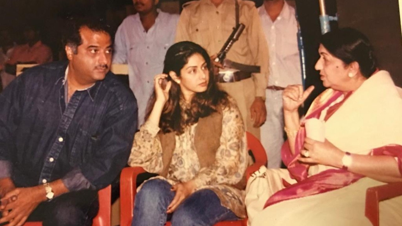 The world of Bollywood -- where movies were unthinkable without at least six songs and where everything from romance to grief was narrated with the help of a ballad -- was where Mangeshkar cut her teeth and later made her name. Here, Lata Mangeshkar is photographed with Boney Kapoor and Sridevi. Credit: PTI File Photo