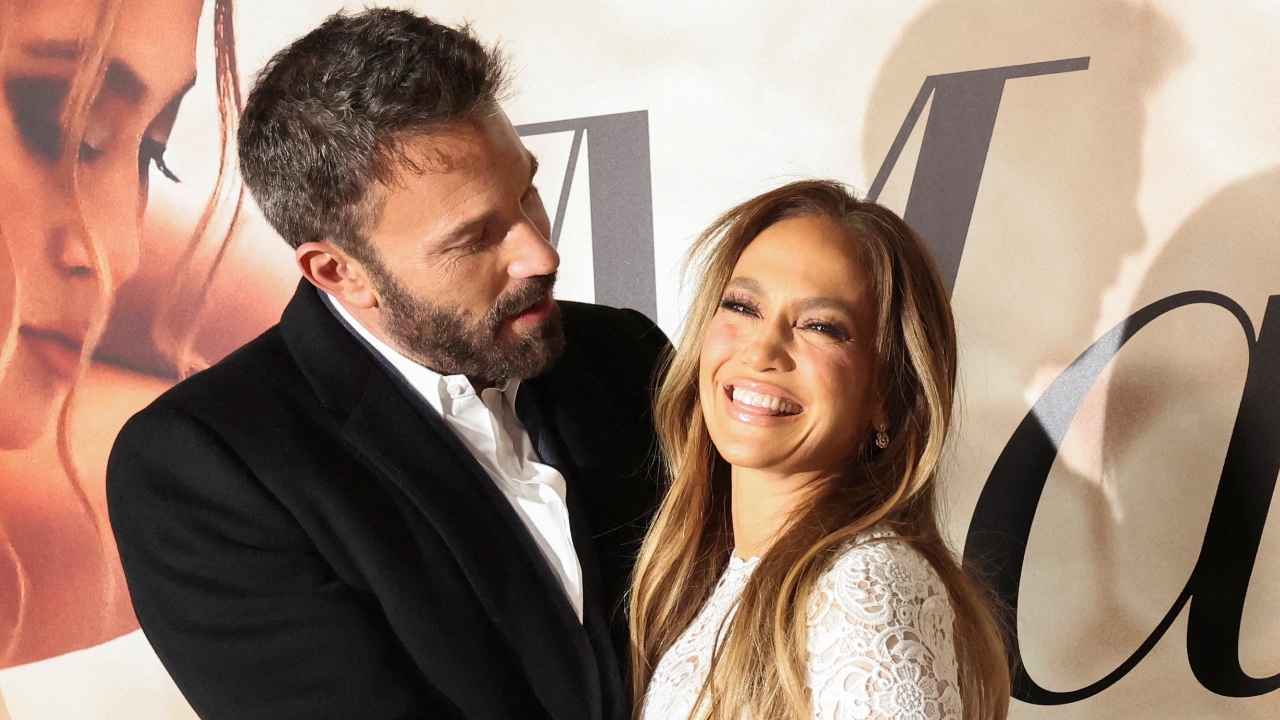 Lopez could hardly contain her joy while posing with Affleck. Credit: Reuters Photo