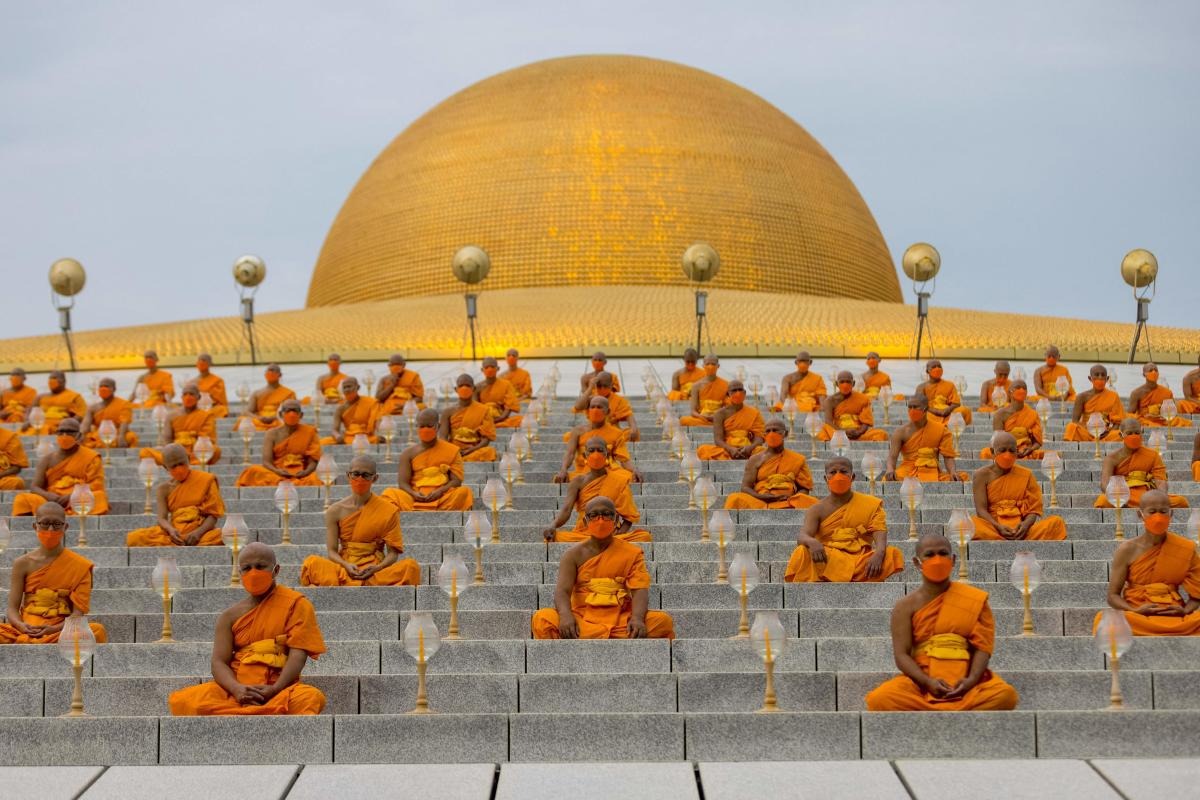 Buddhist monks attend the Makha Bucha celebrations at Wat Dhammakaya temple in Pathum Thani province, north of Bangkok. Credit: AFP Photo