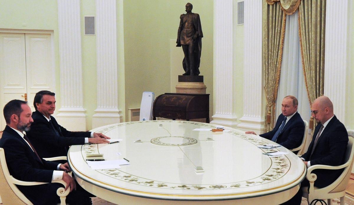 Russian President Vladimir Putin (2ndLR) meets with Brazil's President Jair Bolsonaro (2ndL) at the Kremlin, in Moscow. Credit: AFP Photo
