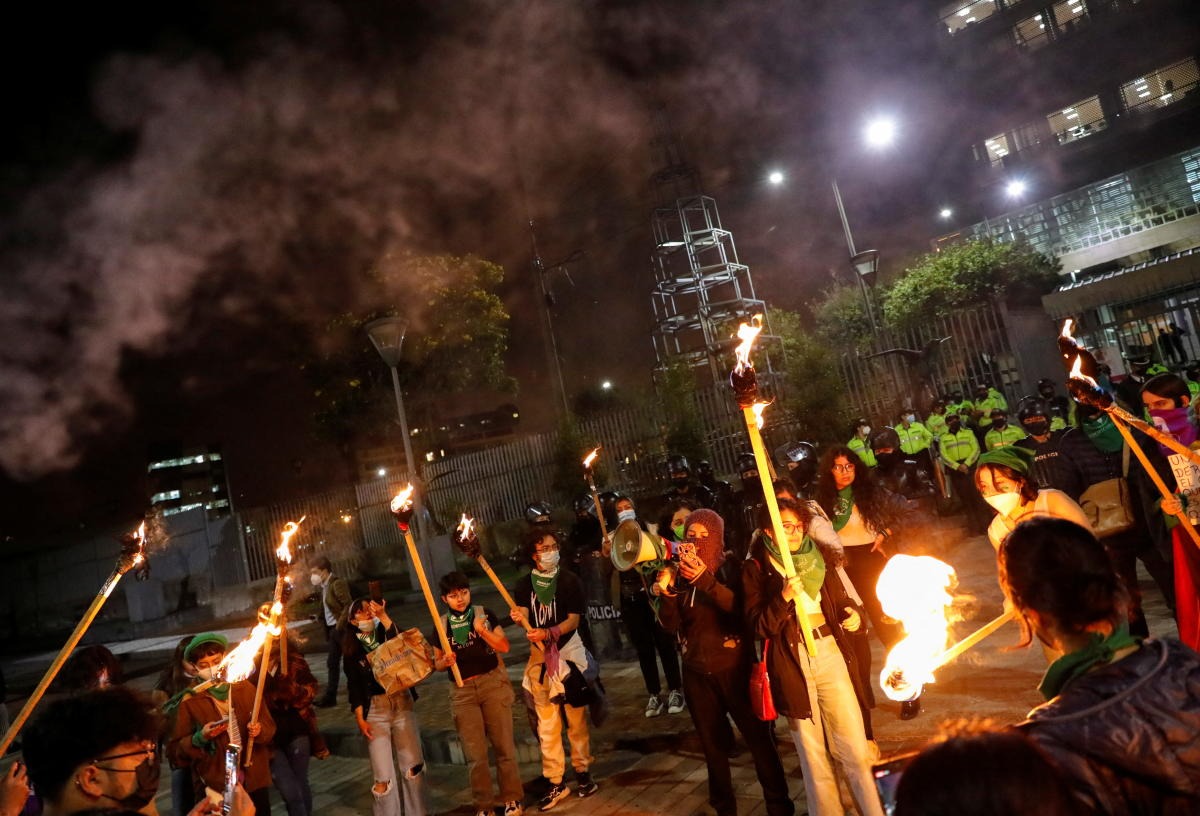 Activists demonstrate in support of abortion rights outside Ecuador's Assembly a day before lawmakers resume the debate to approve regulation of abortion in cases of rape, in Quito, Ecuador. Credit: AFP Photo