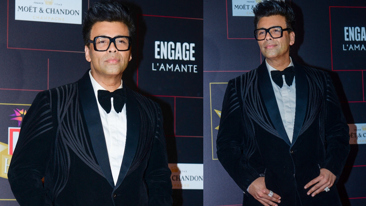 Ace filmmaker Karan Johar kept it subtle yet classy in a black tuxedo. Credit: AFP Photo