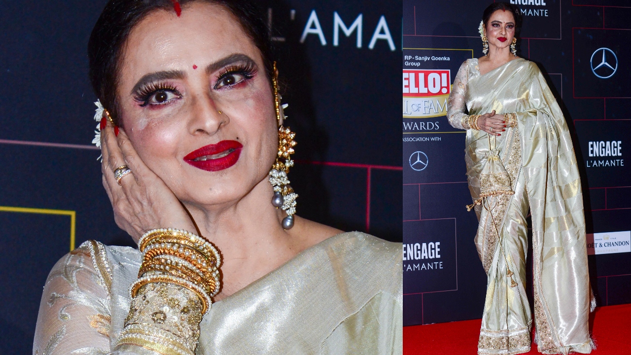 The evergreen star Rekha draped a shiny golden Kanjeevaram saree. Credit: AFP Photo