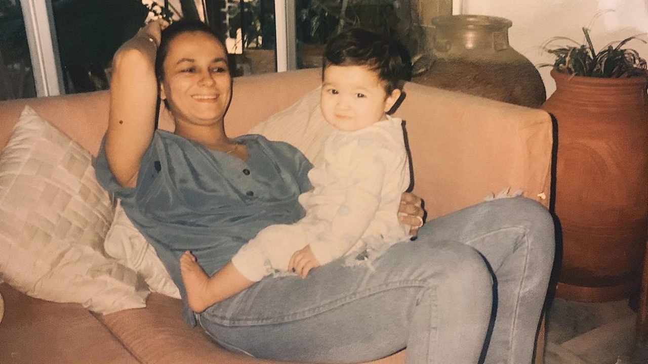 Alia seated on her mother's lap and looking adorable as ever. Credit: Instagram/aliaabhatt
