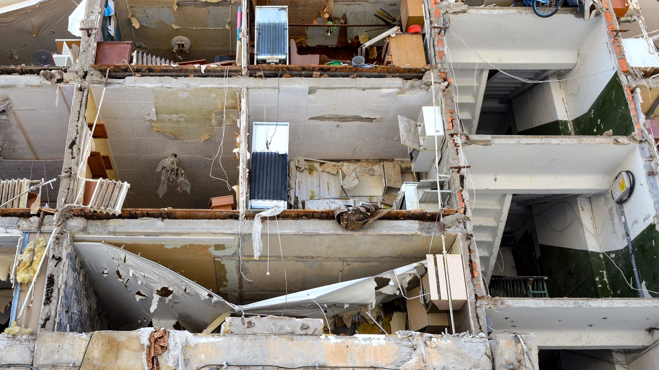 A general view of an apartment that got heavily damaged after a Russian rocket exploded just outside it in Ukraine. Credit: AFP Photo