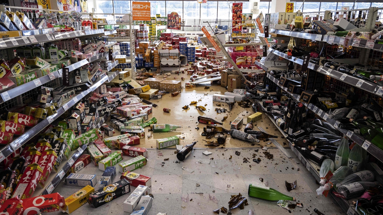 Cosmetics and other merchandise at convenience stores fell from shelves and were scattered on the floor. Credit: AFP Photo