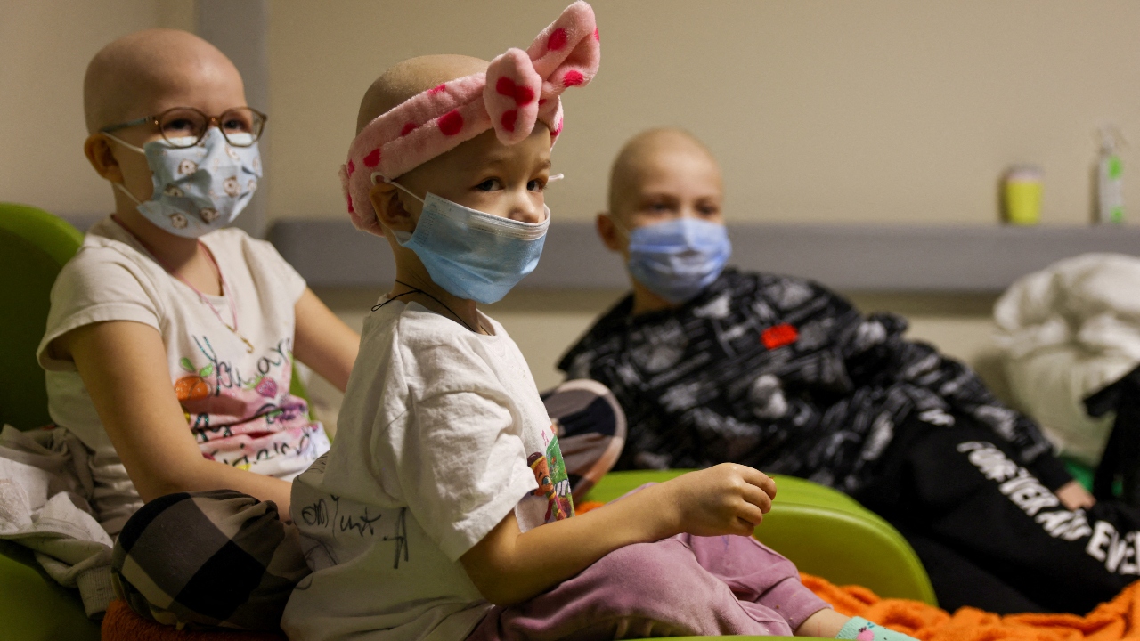 Children, who are undergoing treatment, sit on chairs moved to the hallways of basement floors of Okhmadet Children's Hospital in Kyiv. Credit: Reuters Photo