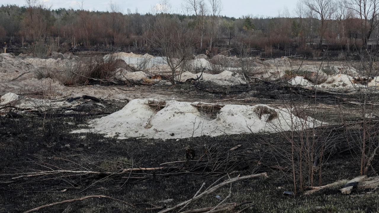 Trenches dug by the Russian military are seen in an area with high levels of radiation near the Chernobyl Nuclear Power Plant. Credit: Reuters Photo