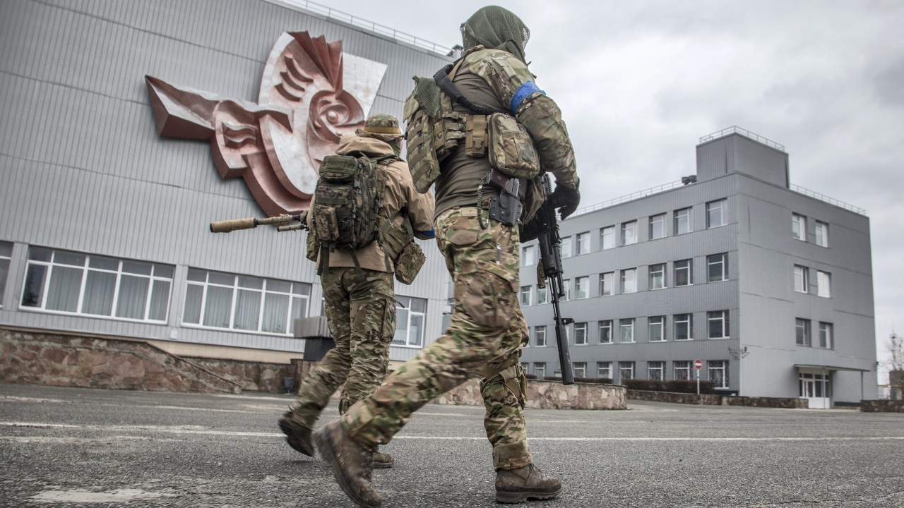 Ukrainian servicemen keep a strict vigil at the Chernobyl nuclear plant, in Ukraine. Credit: AP/PTI Photo