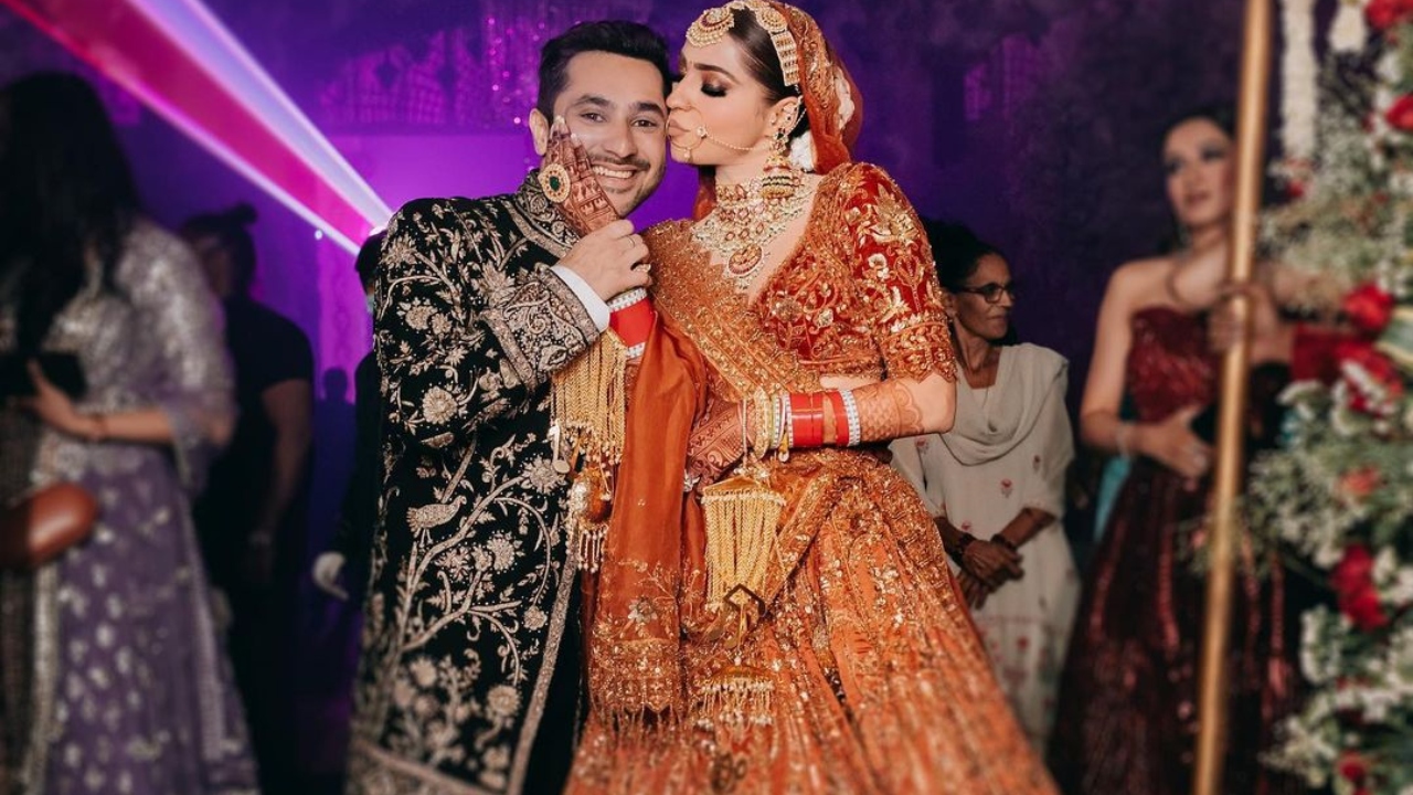 Harsh Beniwal and his sister Pria Beniwal pose for a happy picture. Credit: Dipak Studios