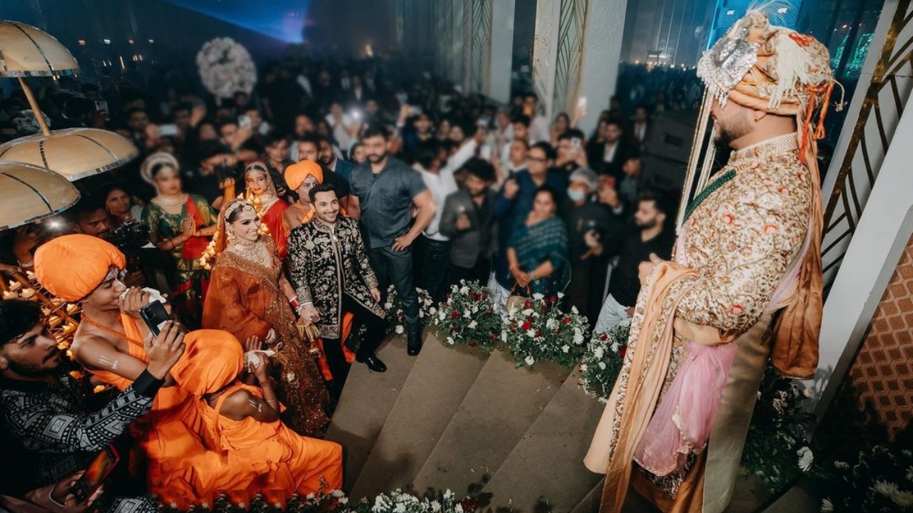 A candid picture of Pria Beniwal and Millind Gaba from their wedding. Credit: Dipak Studios