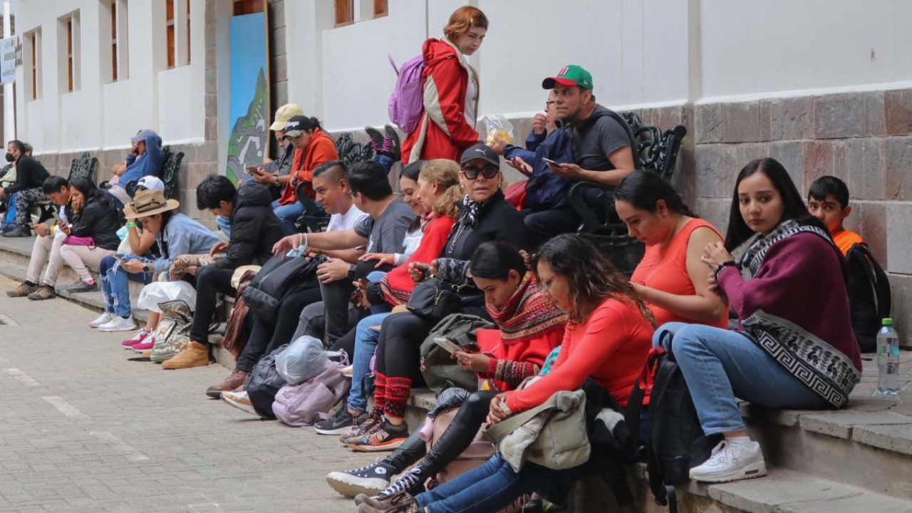 Stranded tourists wait in the village of Machu Picchu, in Peru's Cusco region, on April 19, 2021, as the train service to and from the Machu Picchu Inca citadel has been suspended due to a strike. Credit: AFP Photo