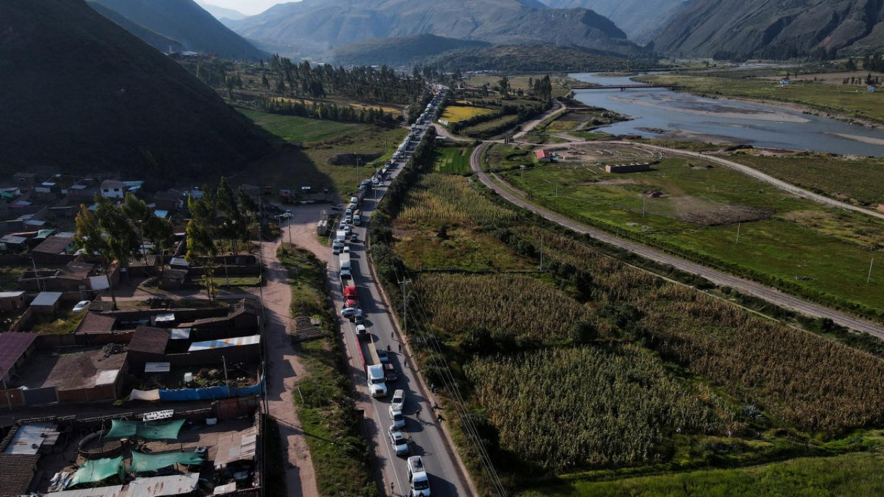 Vehicles are backed up ahead of a roadblock in the community of Andahuaylillas during a protest against a rise in the cost of living triggered by the Russian invasion of Ukraine, outside of Cuzco. Credit: Reuters photo