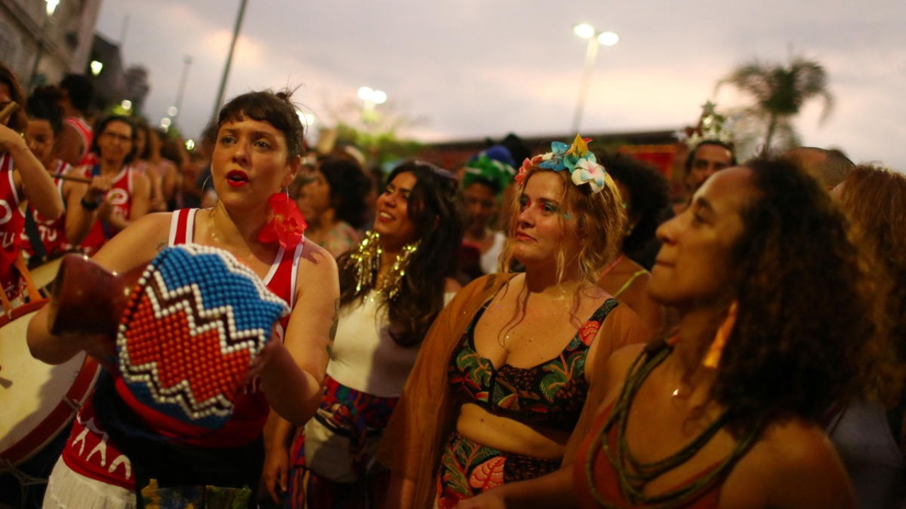 Revellers participate in the annual block party known as