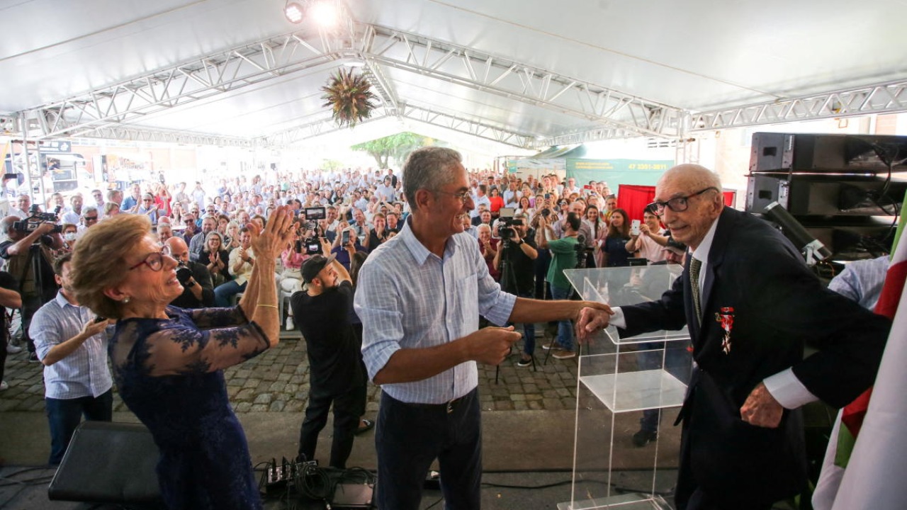 Walter Orthmann, 100, the winner of a Guinness World Record for having the longest career (84 years) at the same company, attends his birthday party in Brusque, Santa Catarina state, Brazil. Credit: Reuters photo