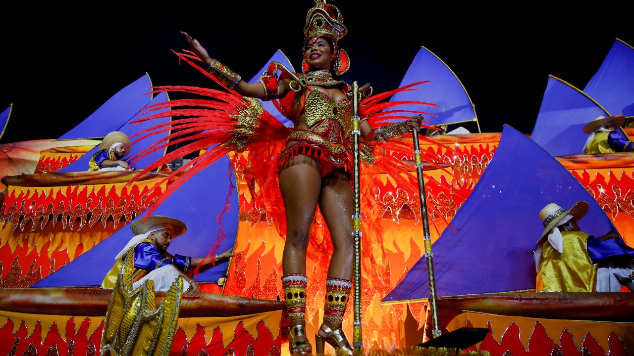 An artist performs during the second night of the Carnival parade at the Sambadrome in Rio de Janeiro, Brazil. Credit: Reuters Photo