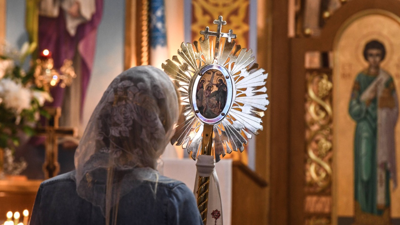A person prays during a service for Orthodox Easter at the All Saints Ukrainian Orthodox Church in the East Village neighborhood in Manhattan in New York City. Credit: AFP Photo