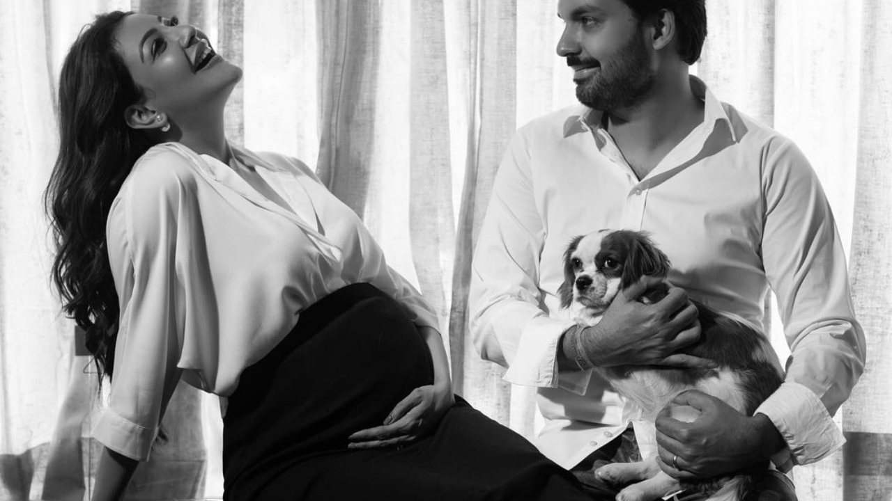 Kajal smiles her heart out in this perfect family monochrome picture! Credit: Instagram/kajalaggarwalofficial