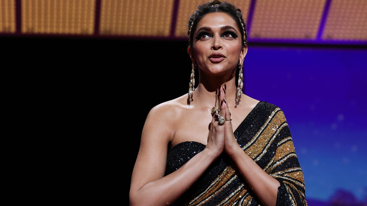 Jury member Deepika Padukone gestures as she arrives on the stage. Credit: AFP Photo