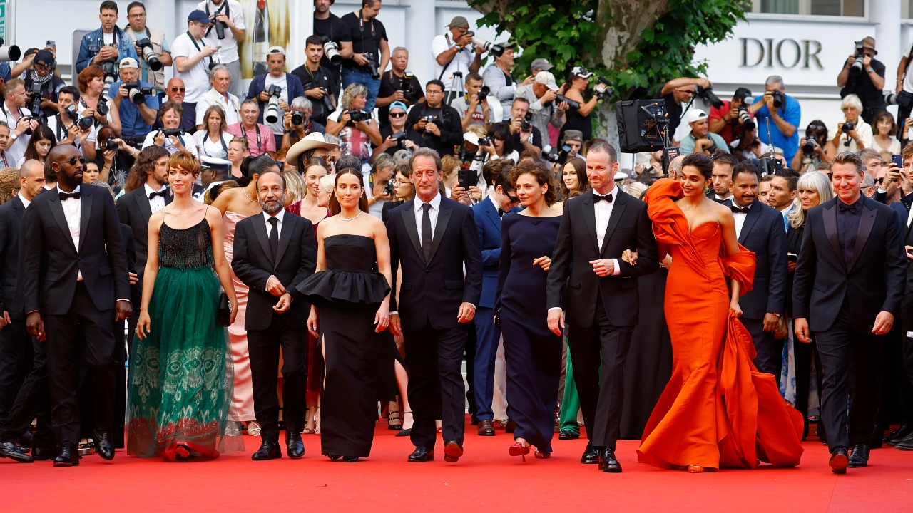 Jury members of the 75th Cannes Film Festival pose together for a photo-op. Credit: Reuters Photo