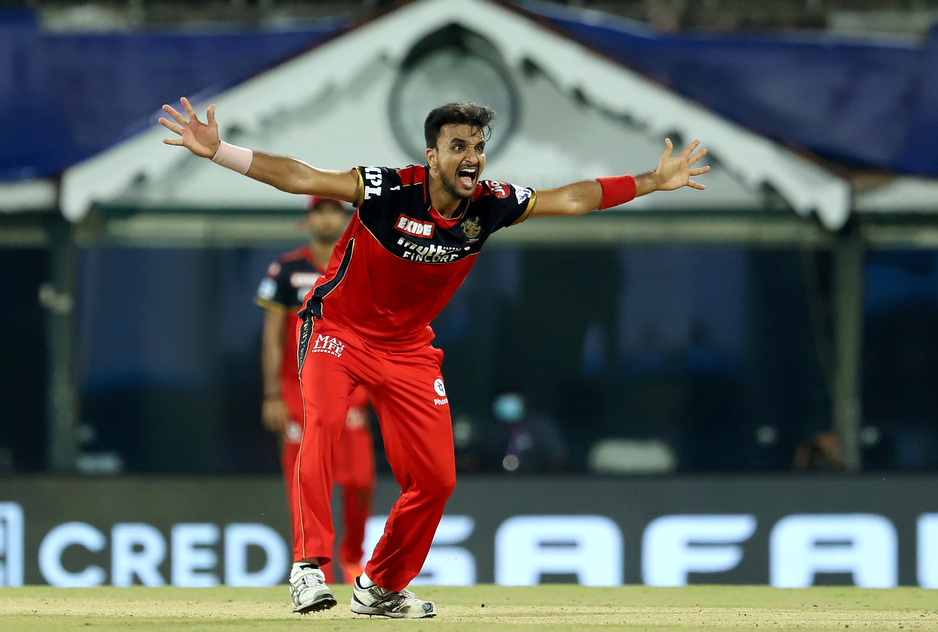 Rank 9 | Harshal Patel (RCB) | Wickets: 19 | Matches: 15 | Economy: 7.57
