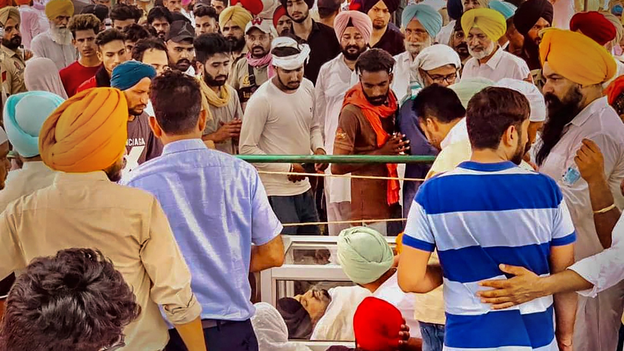 Moosewala's family, including his parents, were inconsolable as they sat beside the body at their home. Credit: PTI Photo