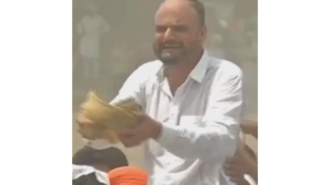 The singer's father, Balkour Singh, even took off his turban on seeing the sea of mourners. Credit: PTI Photo