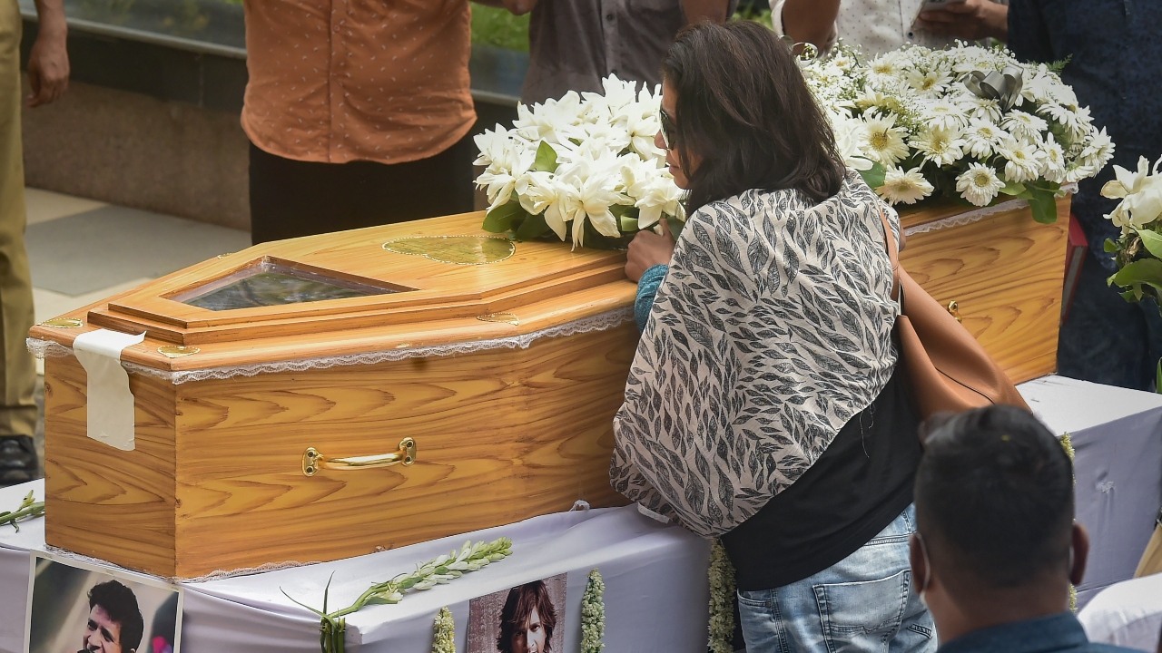 KK's wife is seen sobbing in grief over the loss of her special one. Credit: PTI Photo