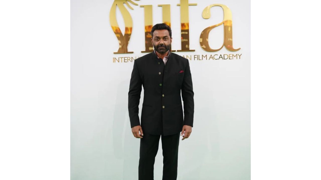 Bobby Deol seen posing on the green carpet of IIFA Rocks 2022. Credit: IIFA