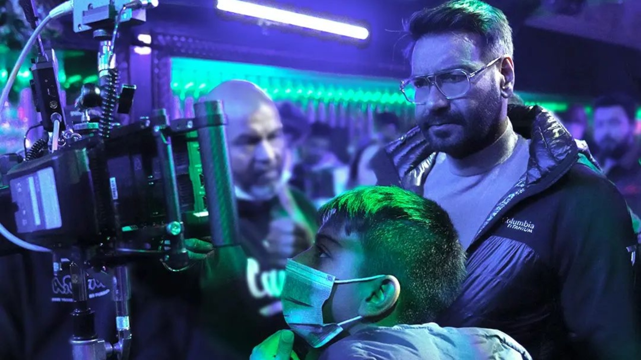Ajay Devgn posted an unseen picture with his son Yug from a movie set. He went down memory lane by sharing his experience of filmmaking with his father late director Veeru Devgn. Credit: Instagram/@ajaydevgn