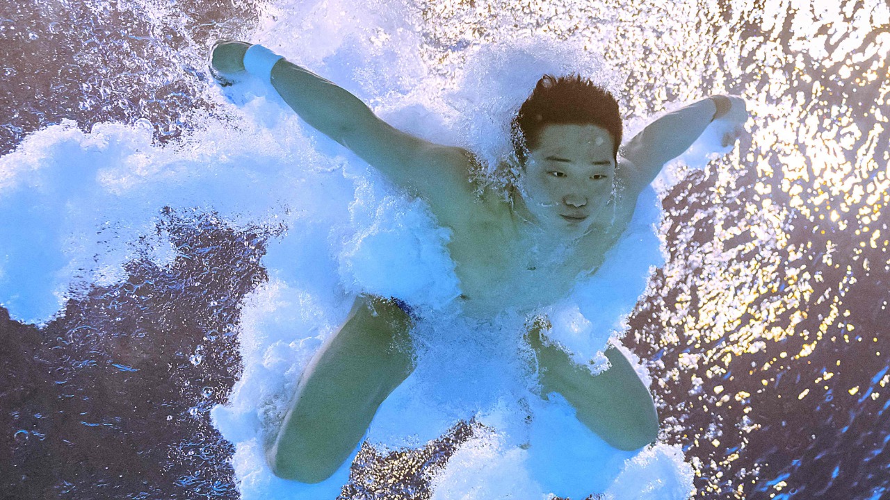 China's Zongyuan Wang competes during the semifinals of the men's 3m springboard diving event as part of the Budapest 2022 World Aquatics Championships at the Duna Arena in Budapest. Credit: AFP Photo