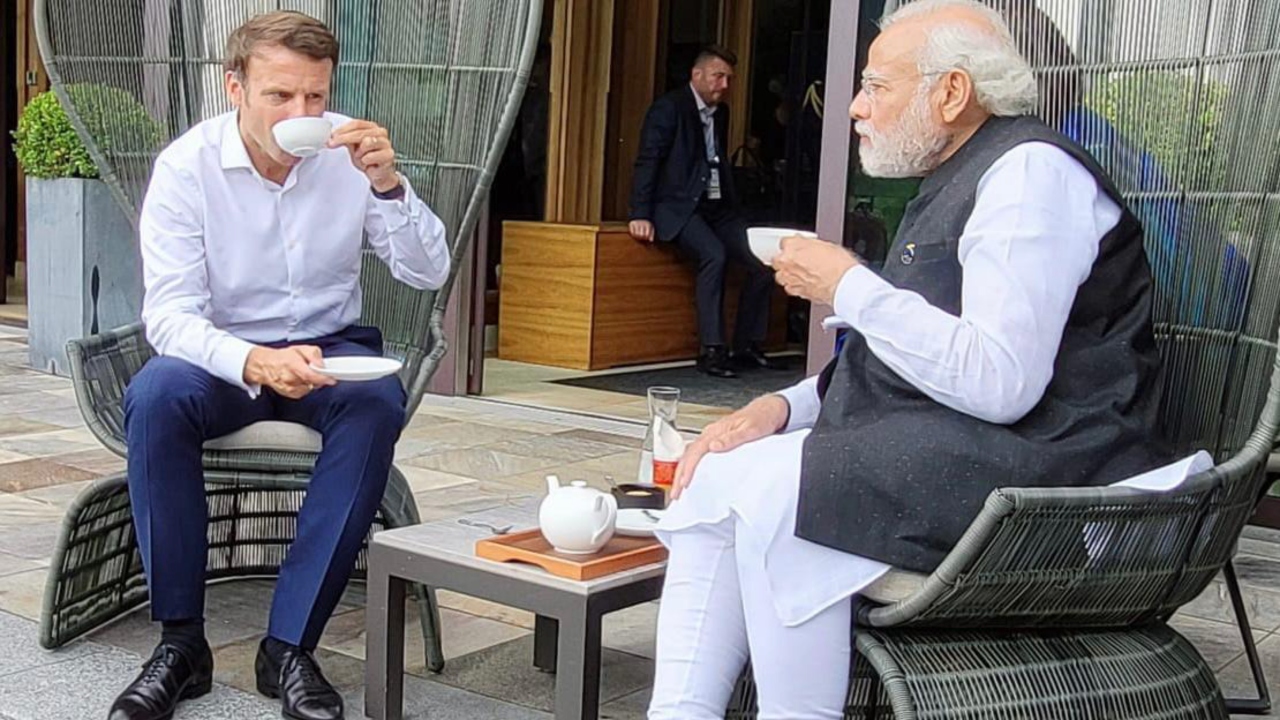 Visuals of PM Modi enjoying a drink with French President Emmanuel Macron also surfaced online. Credit: Twitter/@BJPLive