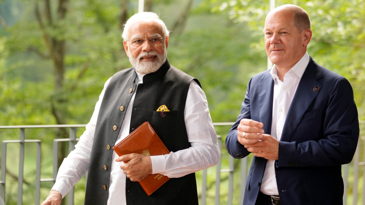 German Chancellor Olaf Scholz walks with Prime Minister Narendra Modi prior to a meeting on the sidelines of the G7 summit in Germany. Credit: AP Photo