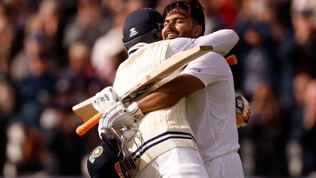 Rishabh Pant celebrates reaching his century with Ravindra Jadeja. Credit: Reuters Photo