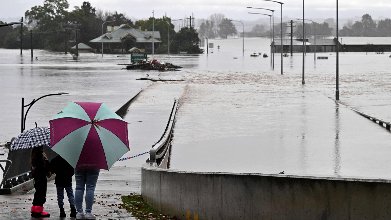 The New South Wales state government declared a disaster across 23 local government areas overnight, activating federal government financial assistance for flood victims. Credit: AFP Photo