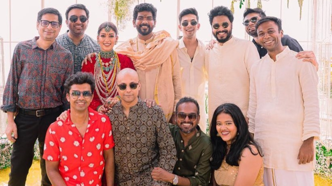 Vignesh Shivan and Nayanthara pose with their friends. Credit: Instagram/wikkiofficial