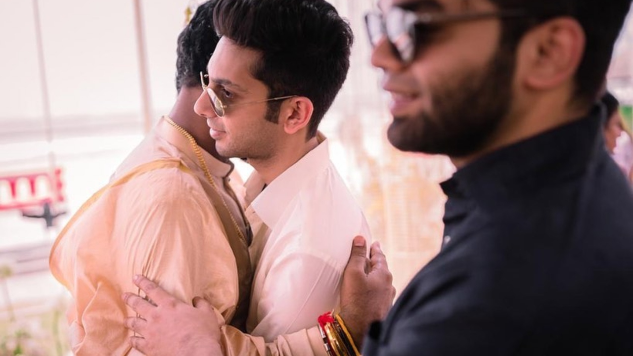 Anirudh Ravichander hugs Vignesh Shivan at latter's wedding ceremony. Credit: Instagram/wikkiofficial