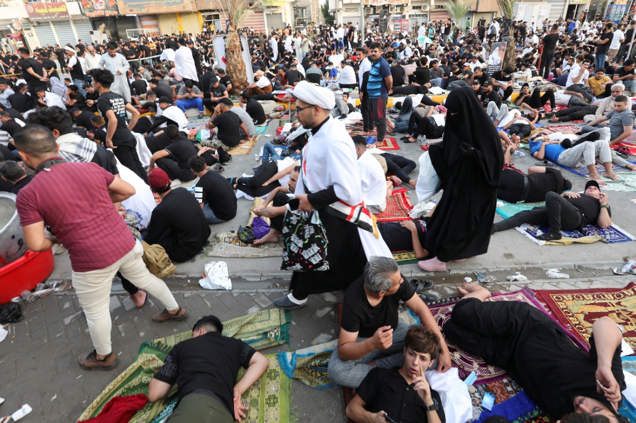 Supporters of Shi'ite cleric Moqtada al-Sadr gather for mass Friday prayer in the Sadr City district of Baghdad, Iraq.
