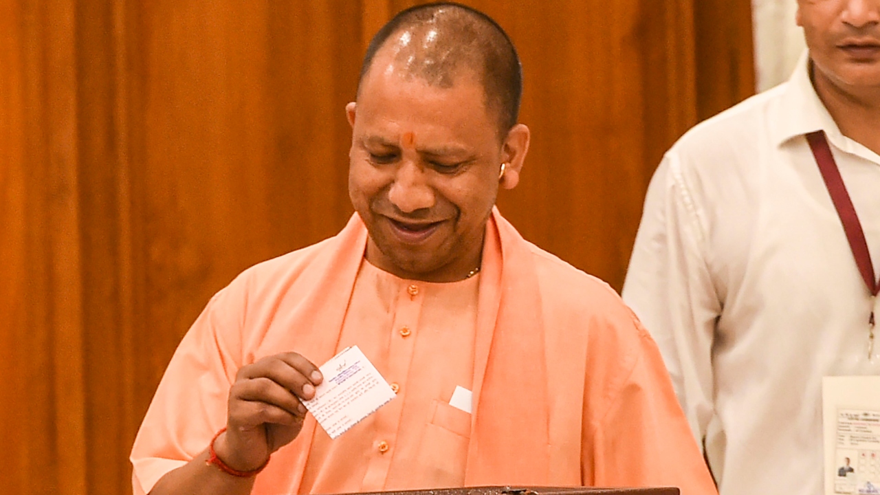 Uttar Pradesh Chief Minister Yogi Adityanath casts his vote for the presidential election, at the Tilak Hall in UP Vidhan Bhavan, in Lucknow. Credit: PTI Photo
