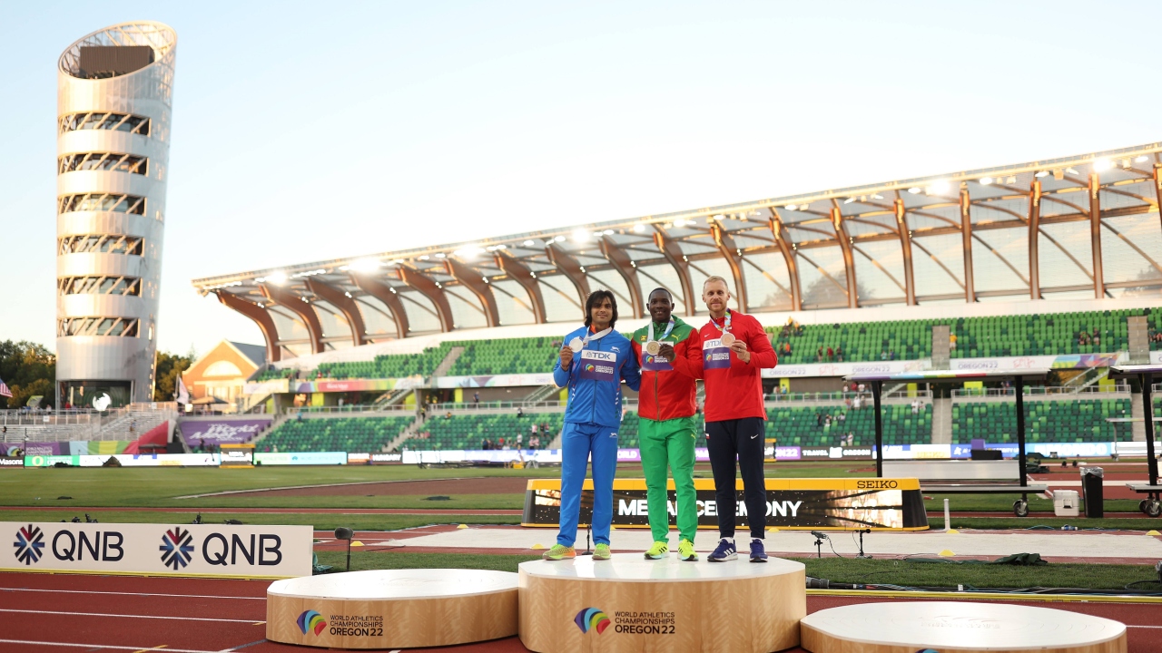 Silver medalist Neeraj Chopra of Team India, gold medalist Anderson Peters of Team Grenada, and bronze medalist Jakub Vadlejch of Team Czech Republic pose on the podium during the medal ceremony for the Men's Javelin Final at the World Athletics Championships Oregon22 in Eugene, Oregon. Credit: AFP Photo