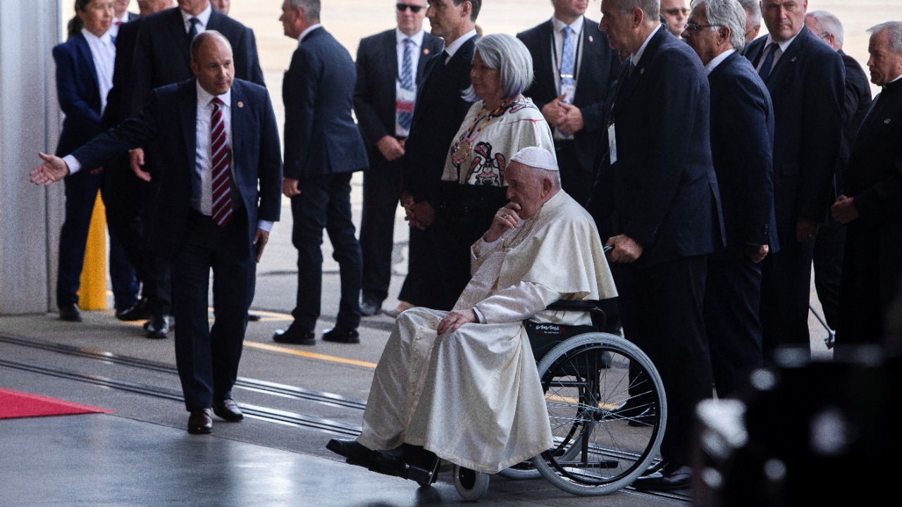 Pope Francis is greeted by Canada's Prime Minister Justin Trudeau and dignitaries as he arrives at the Edmonton International Airport near Edmonton, Alberta, Canada. Credit: Reuters photo