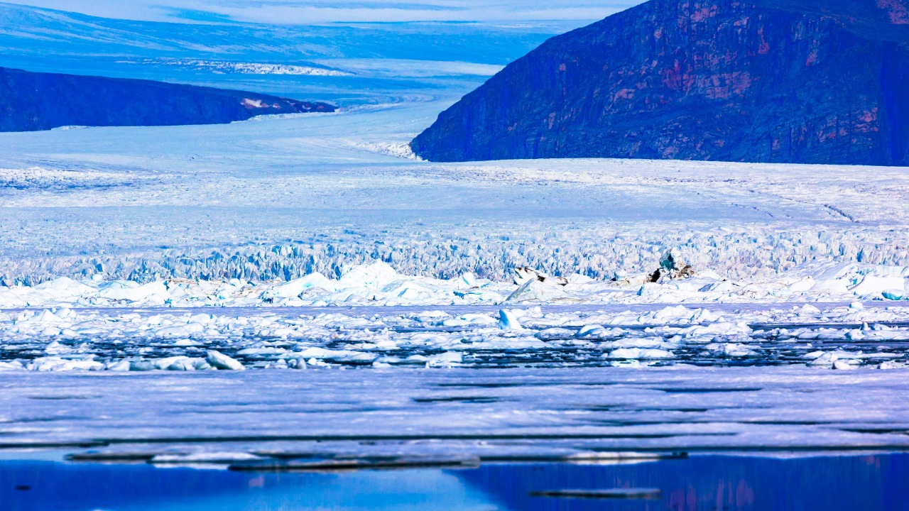 Icebergs float in Baffin Bay near Pituffik, Greenland on July 18, 2022 as captured on a NASA Gulfstream V plane while on an airborne mission to measure melting Arctic sea ice. Credit: AFP Photo