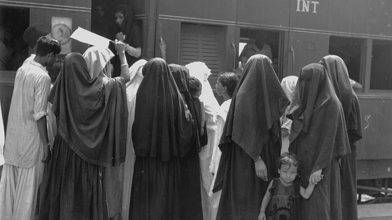 7 August, 1947: Muslim women boarding a train at New Delhi in India to travel to the newly independent Pakistan. Credit: Photo by Keystone Features/Getty Images
