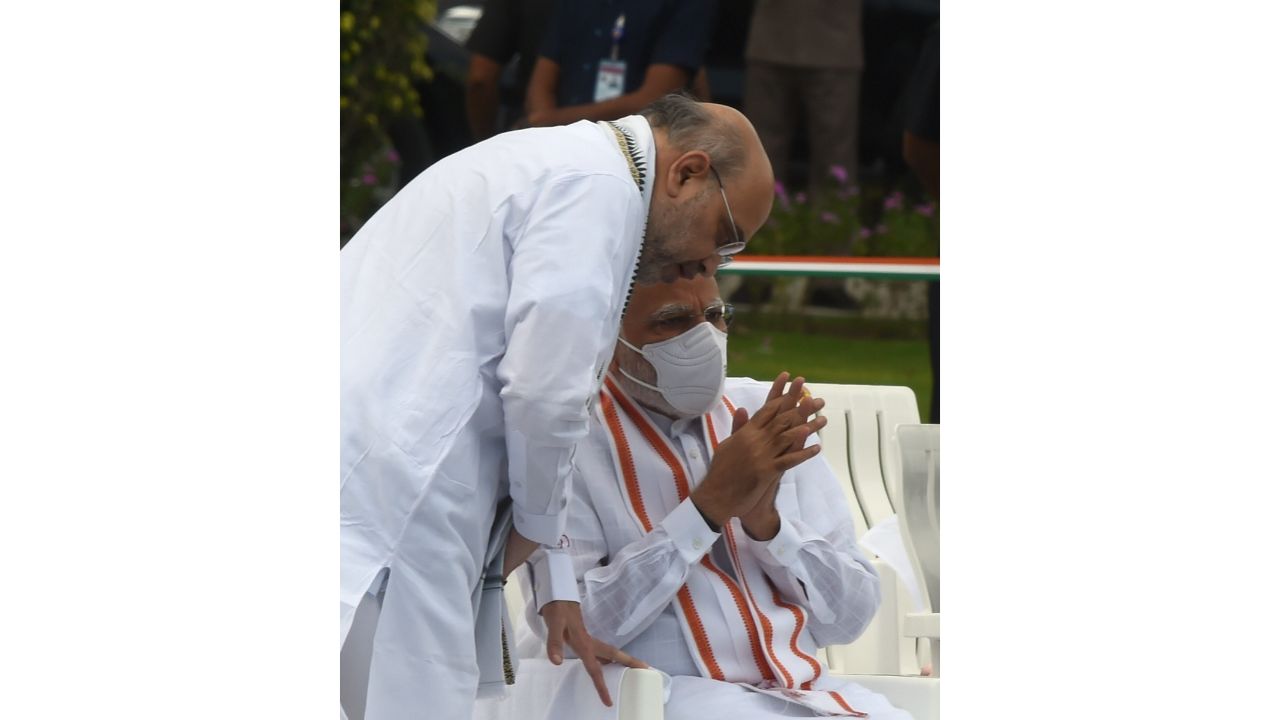 PM Modi and Amit Shah engrossed in a deep conversation after paying tribute to Atal Bihari Vajpayee on his death anniversary at Sadaiv Atal, in New Delhi. Credit: PTI Photo