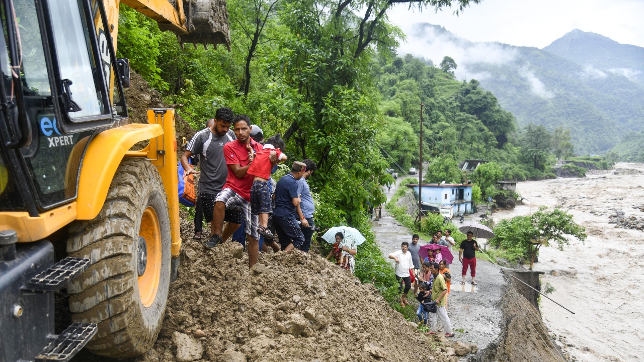 Torrential rains damaged two houses in Gwad village in Tehri district trapping seven people under the debris. Two bodies have been recovered from under the rubble, Tehri District Magistrate Saurabh Gaharwar said. Credit: PTI Photo