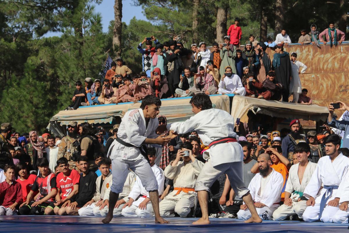 People watch a martial arts demonstration event to celebrate Afghanistan's 103rd Independence Day, which commemorates the country's independence from Britain influence on this day in 1919. Credit: AFP Photo