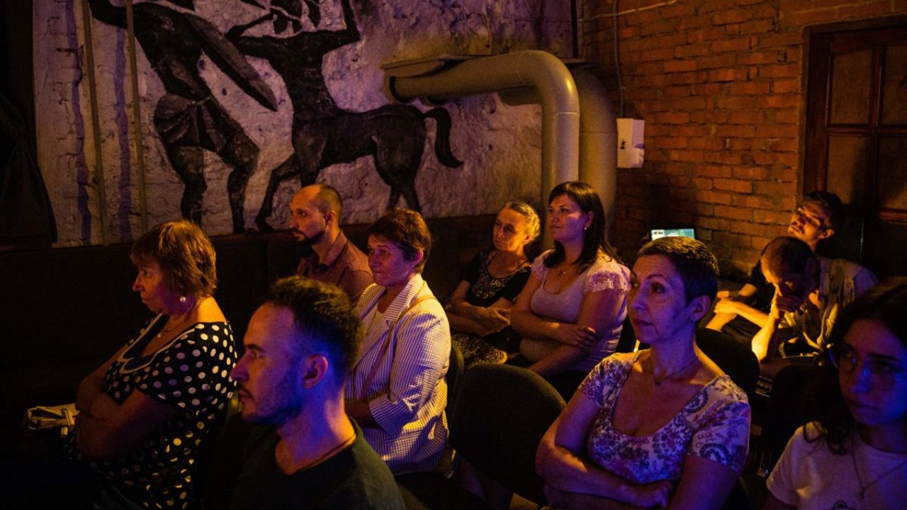 Spectators watch a performance at the underground of the Mykolaiv Drama Theatre for the first time since the start of the war in Mykolaiv, Ukraine. Credit: AFP Photo