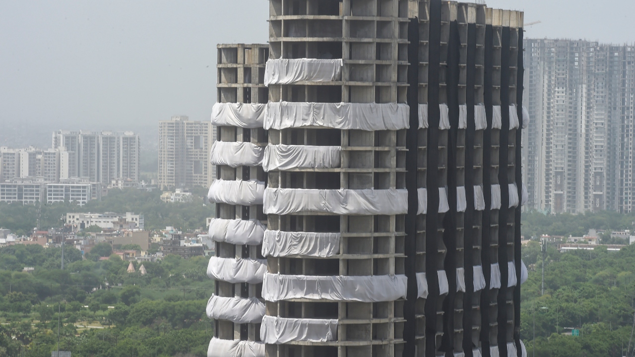 The tallest towers to be demolished in the country -- Ceyane (29 floors) and Apex (32 floors) -- were part of the Emerald Court project of Supertech Ltd and were found to be in violation of multiple regulations regarding construction. Credit: PTI Photo