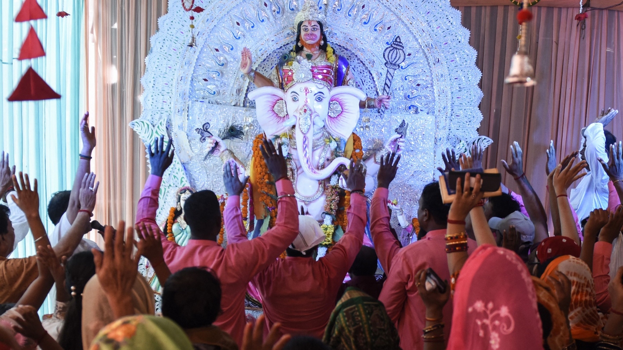 Devotees offer prayers to Lord Ganesha on the occasion of the Ganesh Chaturthi festival in Amritsar. Credit: AFP Photo