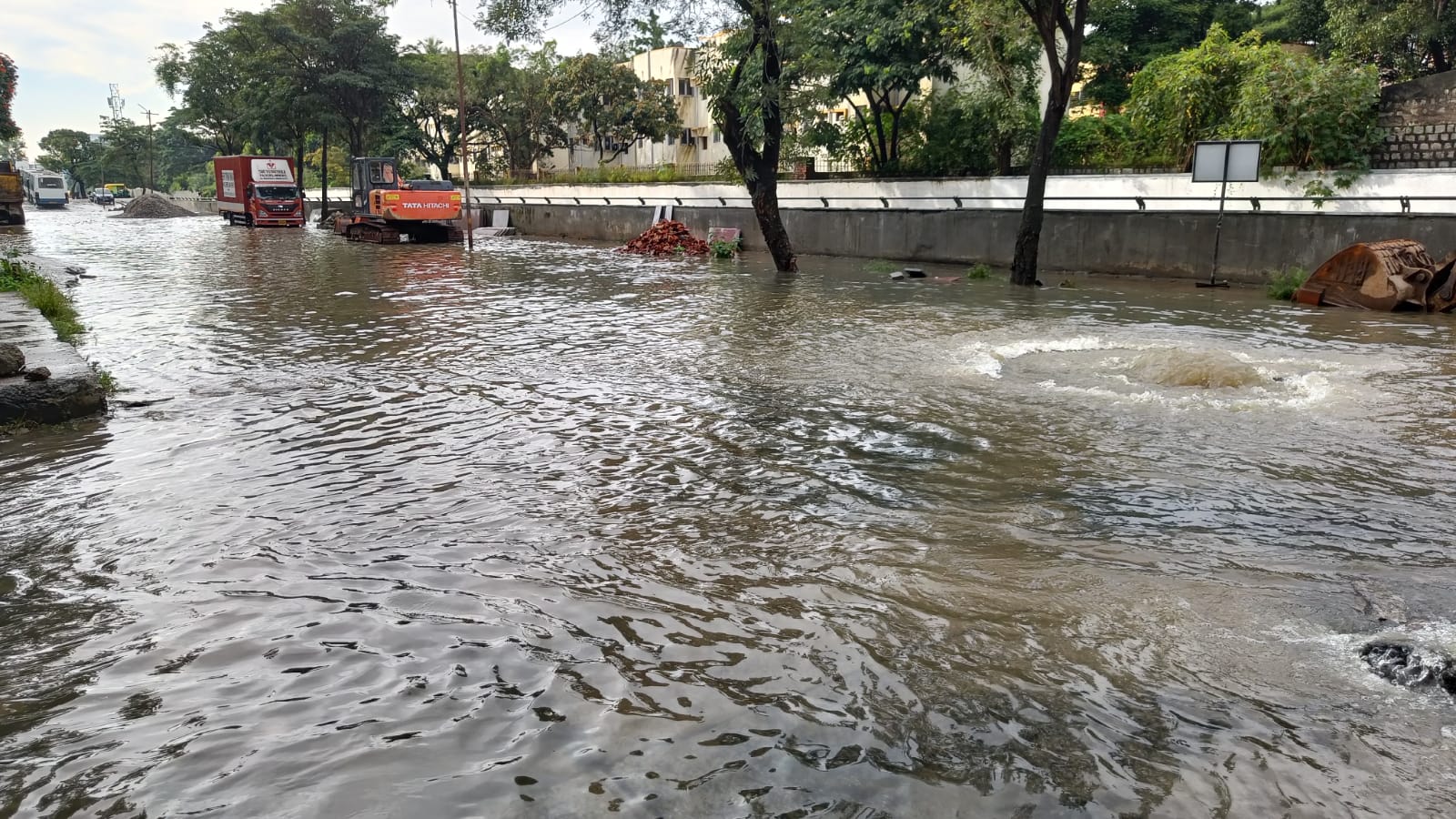So great was the force of rainwater that it gushed into some stations as choked manholes overflowed. Credit: DH Photo/ SK Dinesh